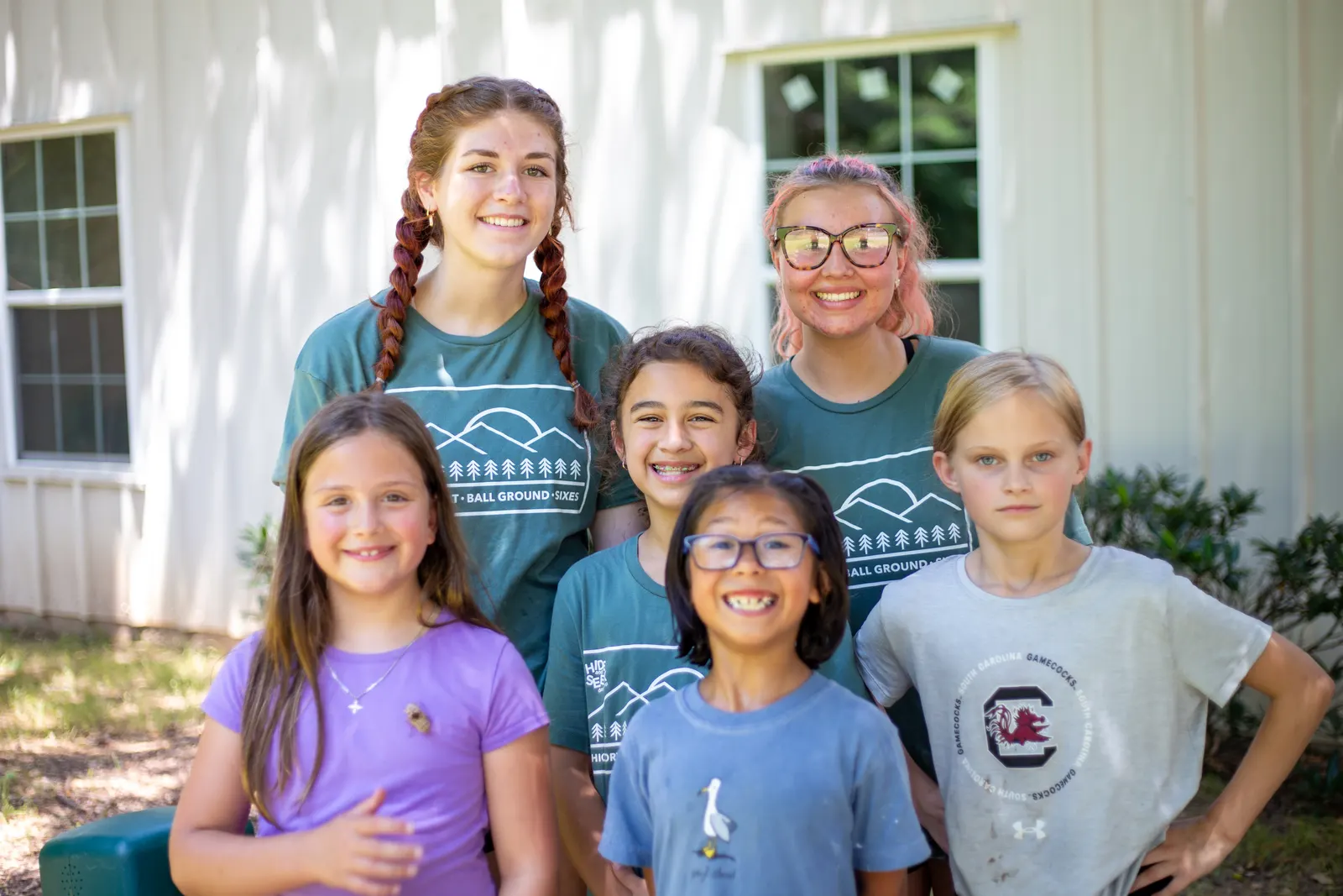 Counselors with a group of girls