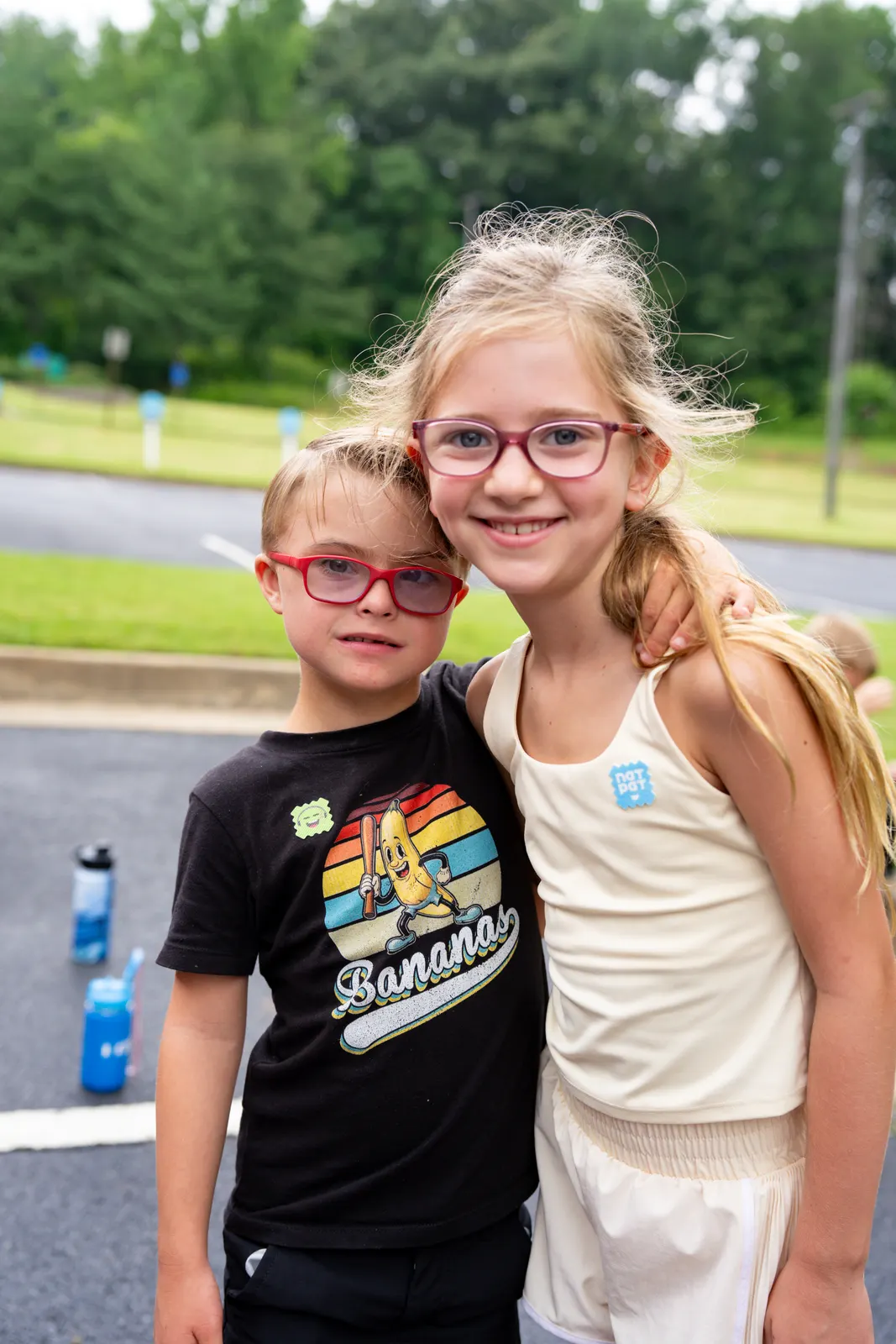 Two campers smiling together