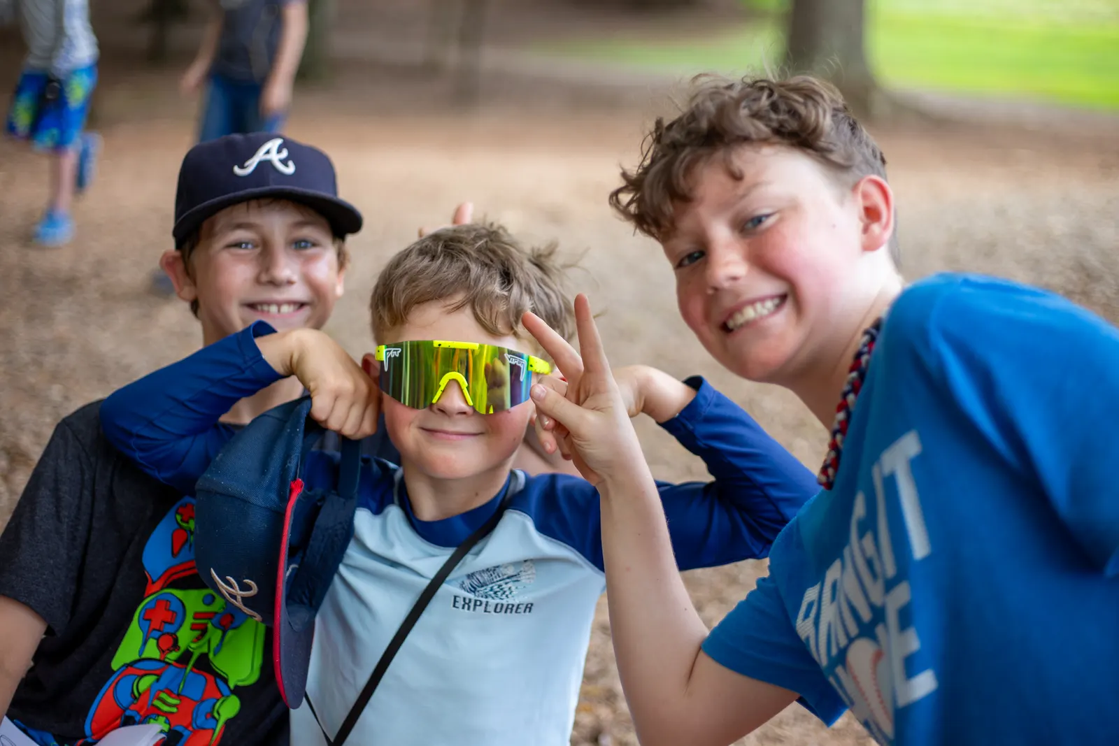 Campers goofing around in silly glasses