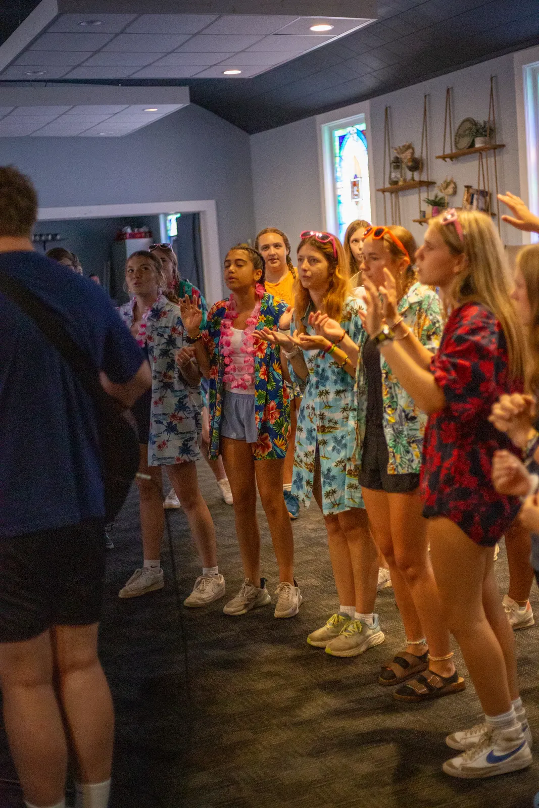 Campers lined up indoors