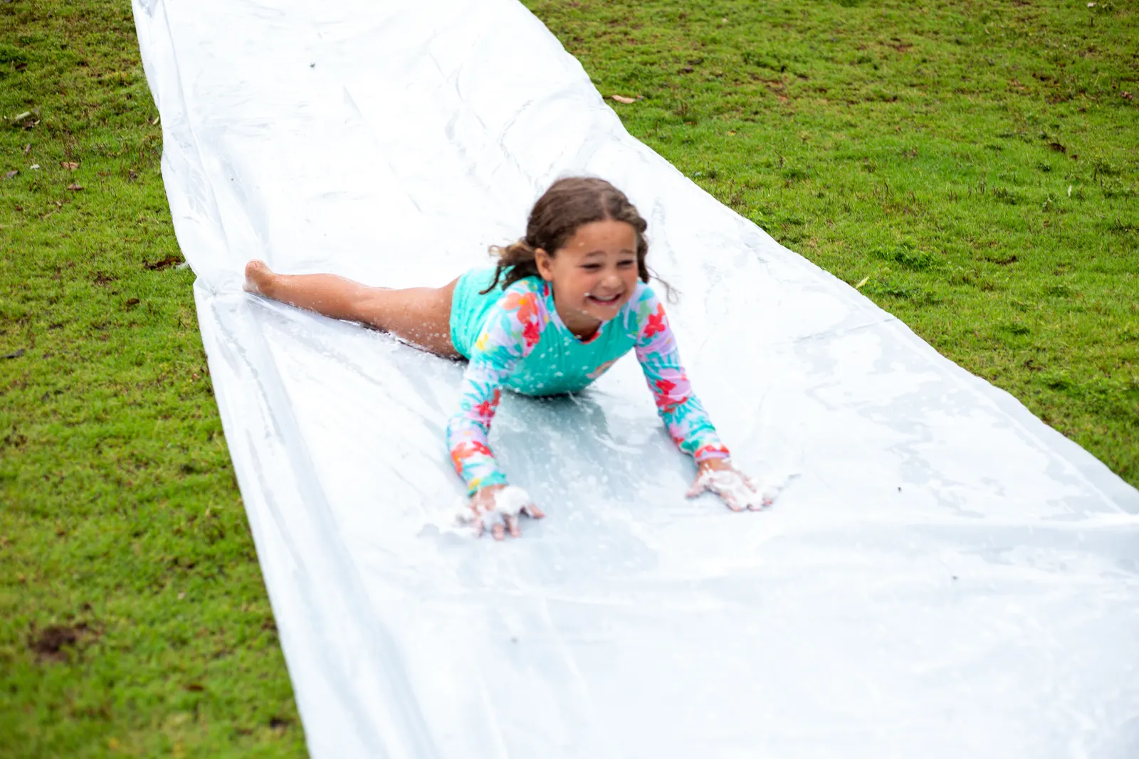 Camper on the slip and slide