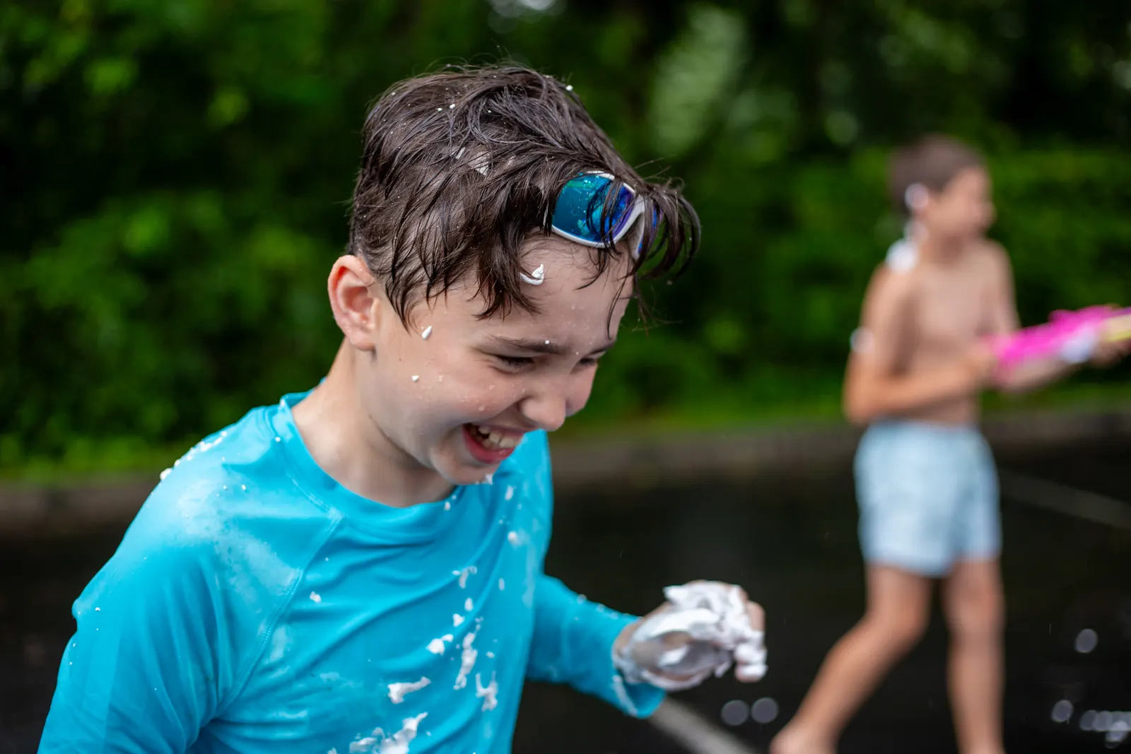 Camper soaked and smiling on water day